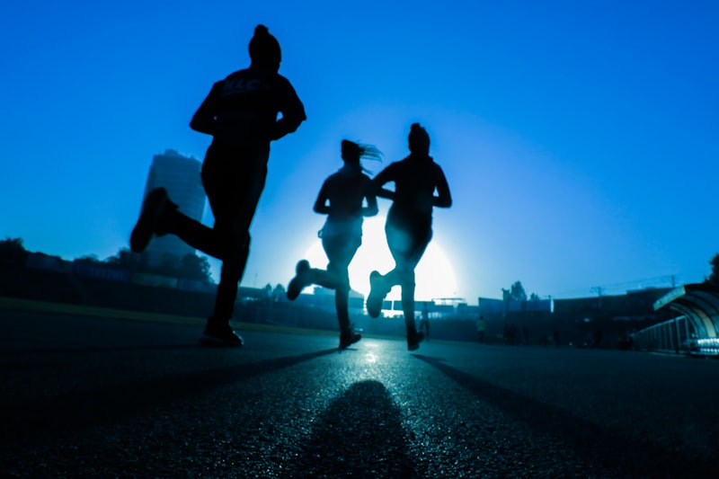 Woman runner at sunrise