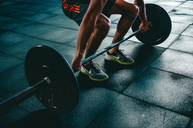 Gym training with dumbbells